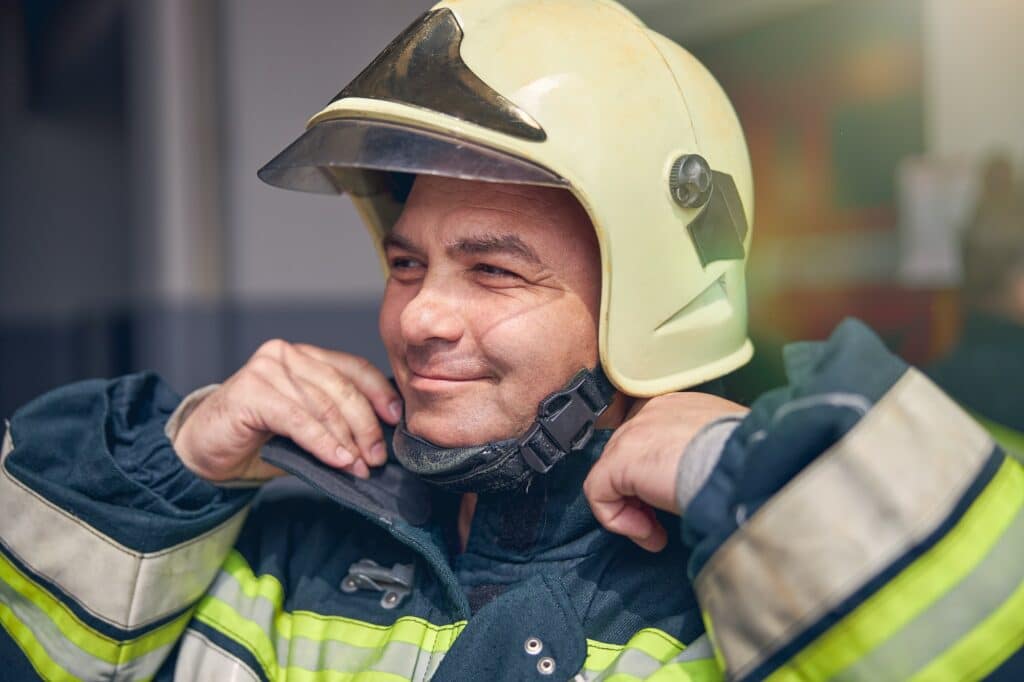 Portrait of fireman in protective uniform and helmet